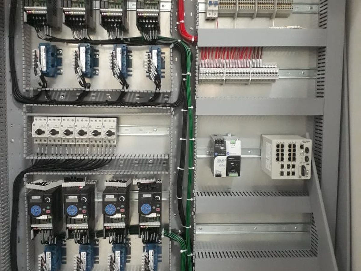 Control panel with variable frequency drives and industrial switch